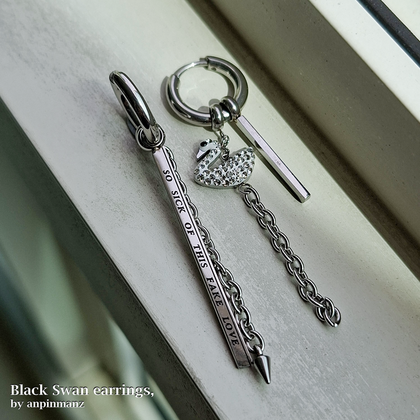 Purple Group Black Swan earrings