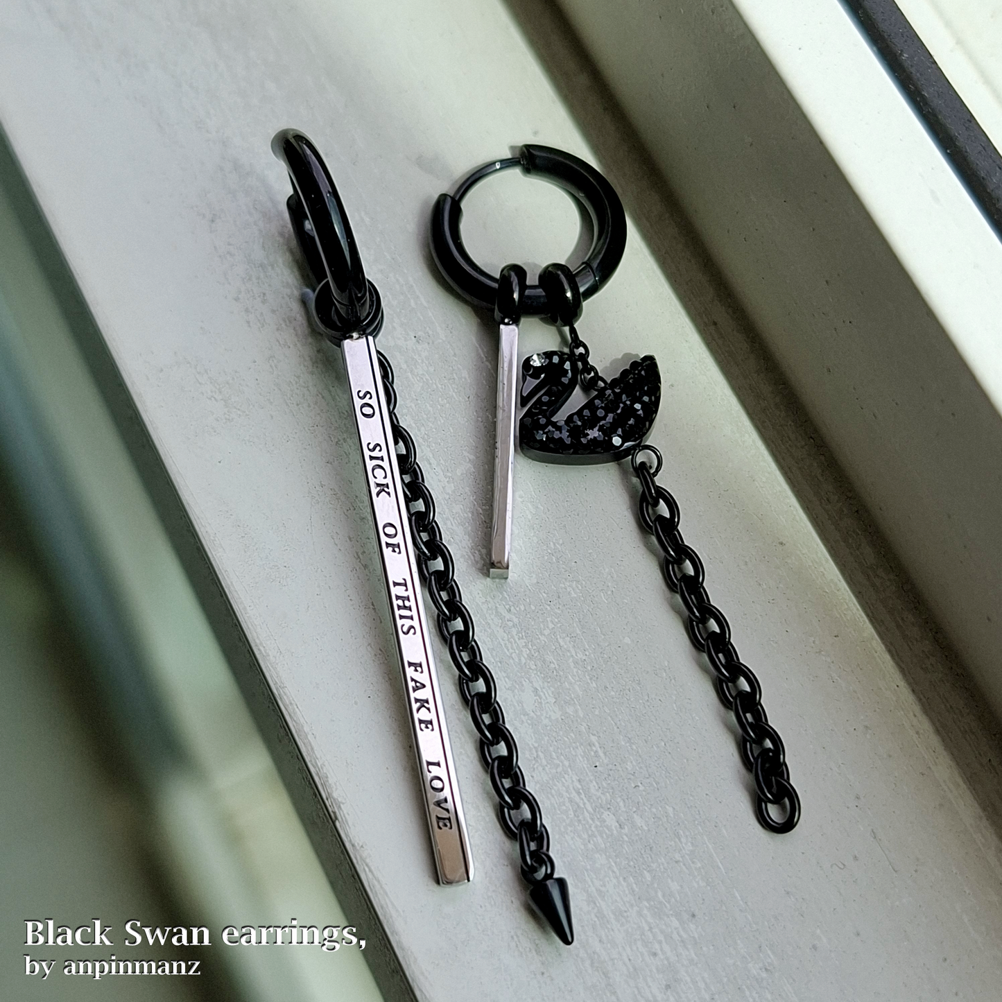 Purple Group Black Swan earrings